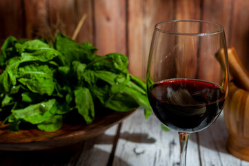 Egg noodles in wooden bowl with vegetables and fresh eggs on table with all natural ingredients