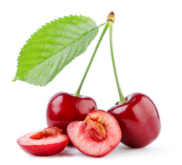 Cherries with a half and a leaf close-up on a white background. Isolated