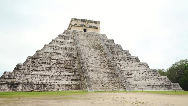 Ancient Chichen Itza pyramid ruins in Yucatan, Mexico on cloudy day. 7 wonders of the world.