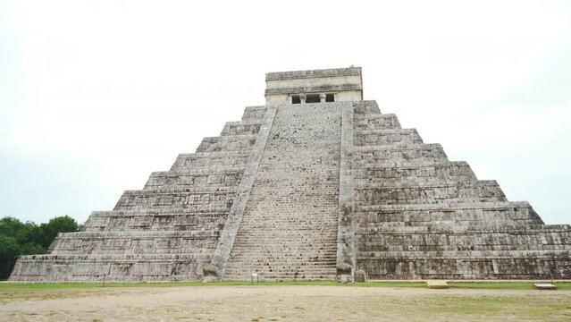 Ancient Chichen Itza pyramid remains in Yucatan, Mexico on a cloudy day. One of the 7 wonders of the world.