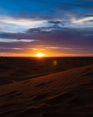 Fototapeta na wymiar sunset in the sand - Merzouga, Morocco