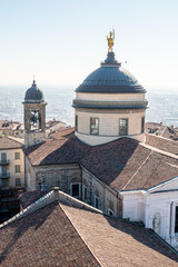 Aerial view of a bell tower and dome in Bergamo