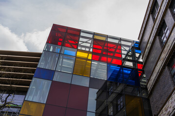 Low angle view of building with colorful facade on street in Wroclaw