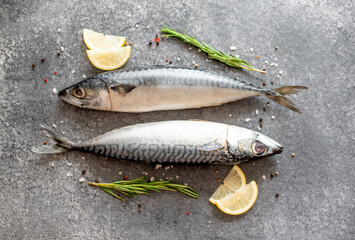 raw mackerel on stone background - obrazy, fototapety, plakaty