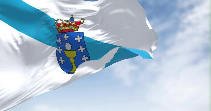 The Galicia flag waving in the wind on a clear day