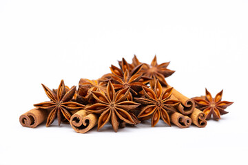 Star anise and cinnamon sticks on a white background isolated. Indian spices close up. Medicinal herbs and spices.
