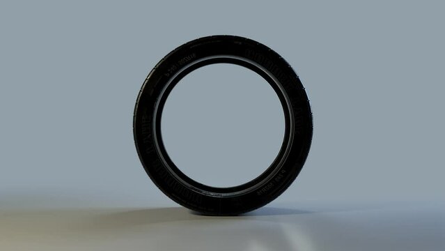 Side on view of a 3D tyre rolling across the screen. Standard black, rubber tyre in a continuous spin. Footage with a luma matte for isolating the object.