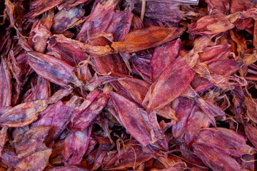 Background and texture of dried squid in the market, Thailand.