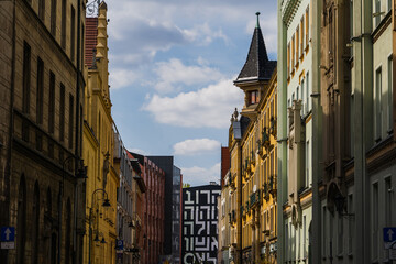Buildings with old facades and sky at background in Wroclaw
