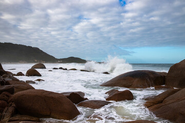 waves crashing on rocks