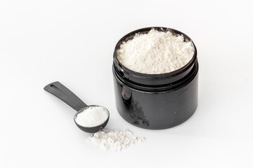 Sports nutrition. Whey protein powder in jar. Fitness and gym diet