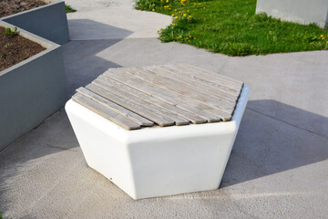 plastic and wooden hexagonal bench isolated, close-up