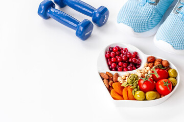 Healthy lifestyle and nutrition eating concept with food in heart shaped dish