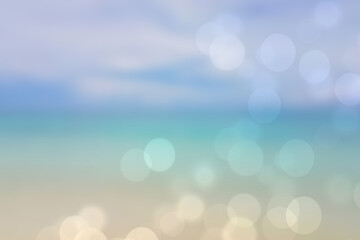 Abstract sea background. Abstract tropical sandy summer beach background with bokeh lights on light blue sky and sun. Beautiful texture. Space.