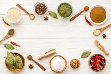 Various powdered spices and herbs in bowls. Cooking background