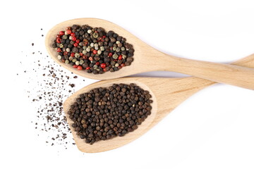Colorful and black peppercorn mix, pepper pile with wooden spoon isolated on white, top view