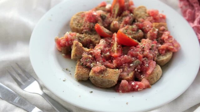 Serving Dakos Appetizer