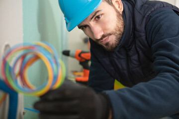 electrician engineer tests electrical installations