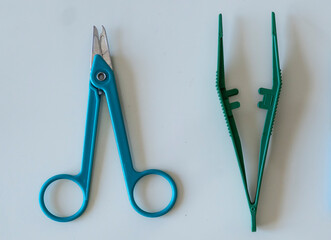 forceps and scissors for removing surgical pins