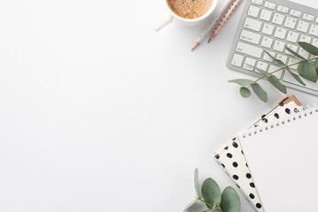 Business concept. Top view photo of workplace keyboard stylish notepads pencils cup of hot drinking...