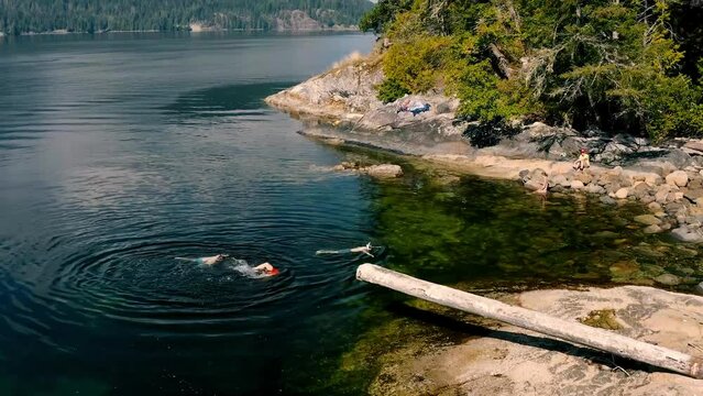 People Is Crab Fishing On The Rocky Shore During Summer In Sunshine Coast, Sechelt, BC, Canada. Aerial Shot