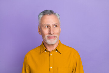 Photo of nice aged grey hairdo man look promo wear yellow shirt isolated on violet color background