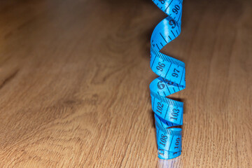 Tailor's measuring tape. Tape for measuring body volume. Tool for sewing clothes