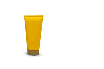 Yellow tube packaging for sunscreen, cosmetic and body care cream isolated on white background. Unbranded moisturizer tube.