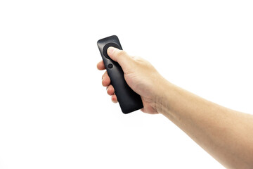 A hand holding a black simple fan remote