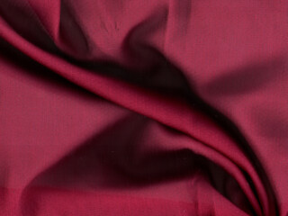 Fototapeta premium Aesthetic maroon cloth background with waves