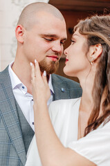 Naklejka premium the bride and groom tenderly embrace