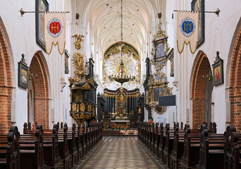 Gdansk, Poland. Interior of Oliwa Cathedral (Archcathedral Basilica of The Holy Trinity, Blessed Virgin Mary and St. Bernard in Gdansk Oliwa). The church was consecrated on August 14, 1594. - 511371404