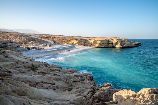 People camping on a beach in the wild coast of the Sultanate of Oman, Middle East, Arabian Peninsula