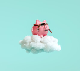 Piggy bank with pilot glasses flying on white fluffy cloud on turquoise blue background 3D Rendering, 3D Illustration - obrazy, fototapety, plakaty