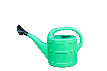 Green plastic sprinkling can outdoor in garden. Watering can.
