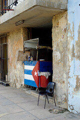 small food shop in the streets of Cardenas with cuban flag