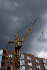 Fototapeta na wymiar construction site with crane and sky