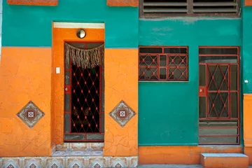 Fotobehang colorful oold houses in havana © chriss73
