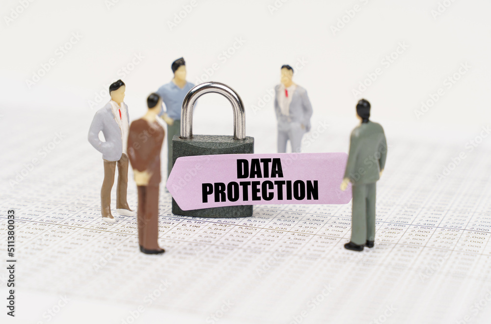Poster there are figures of people on business reports, a padlock with a sticker on which it is written - d