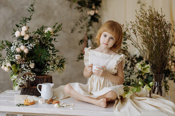 girl eating breakfast sitting on the table