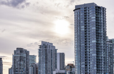 Residential Home Buildings in Downtown Vancouver, British Columbia, Canada. False Creek. Cloudy Sky Background