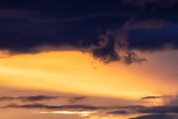 View of Cloudscape during a colorful sunset or sunrise. Taken on the West Coast of British Columbia, Canada. Nature Background