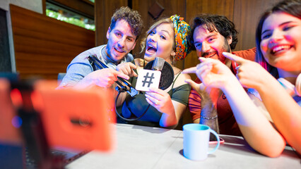 Group of friends conducting live streaming radio program and reminding their fan to following them...