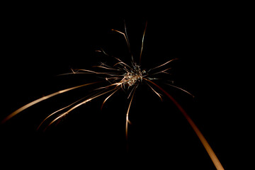 sparks in the dark. lines of light.