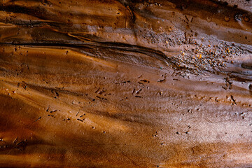 Naklejka premium colored mud river, close view