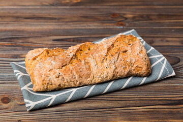 Fresh homemade crisp bread on napkin, top view. Healthy unleavened bread. French bread. Top view Bakery products