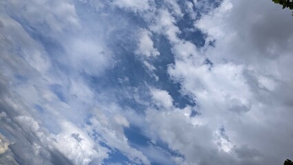 blue sky with fluffy clouds
