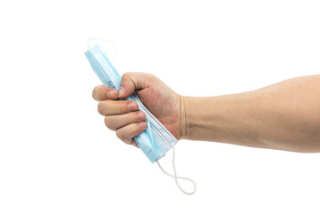 A hand holding a blue mask isolated on white background