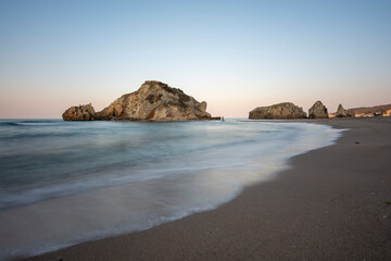 Beach and waves at sunset