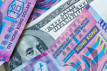 US Dollar and Hong Kong Dollar Money Banknotes, abstract background